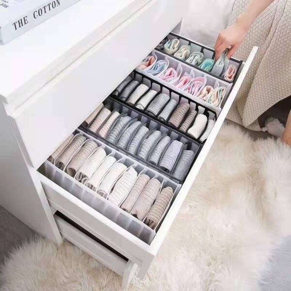 Drawer organizer for underwear, t-shirts, jeans, bra, baby clothes, and socks.